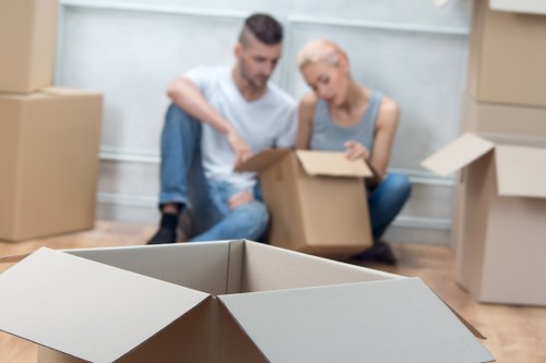 A planned office move with stacked boxes and transport vehicle near Bow premises