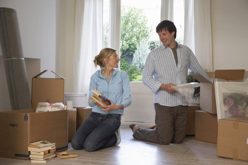 Unpacking service helping a family settle into a Bow property